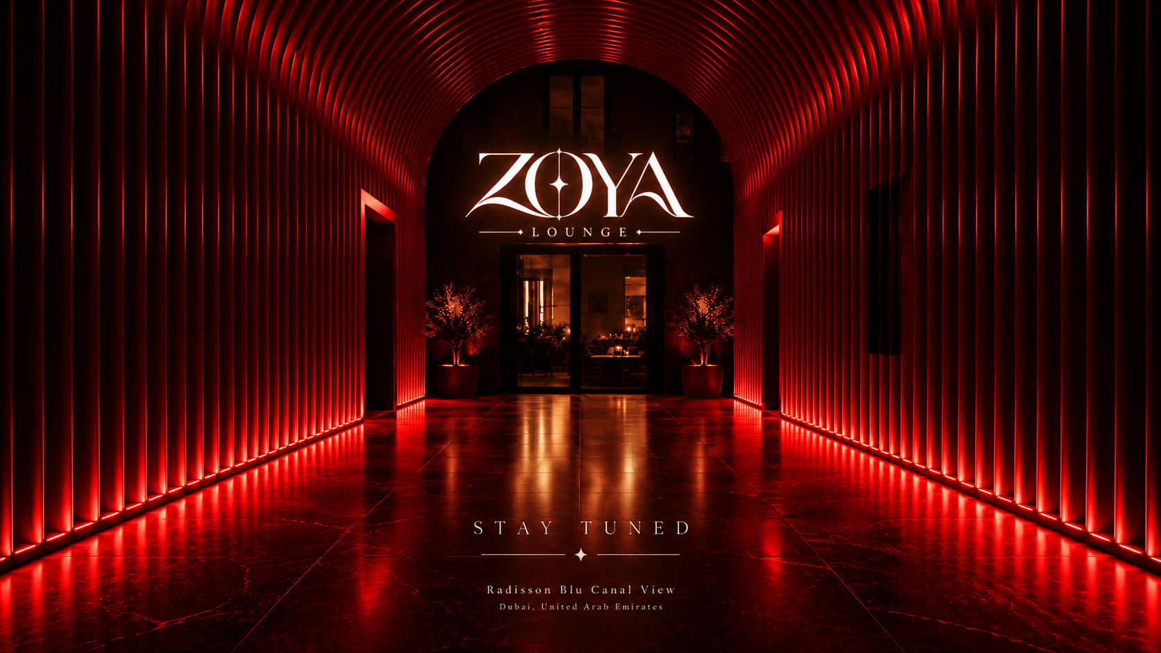Ribbed red arch leading to the ZOYA Lounge entrance