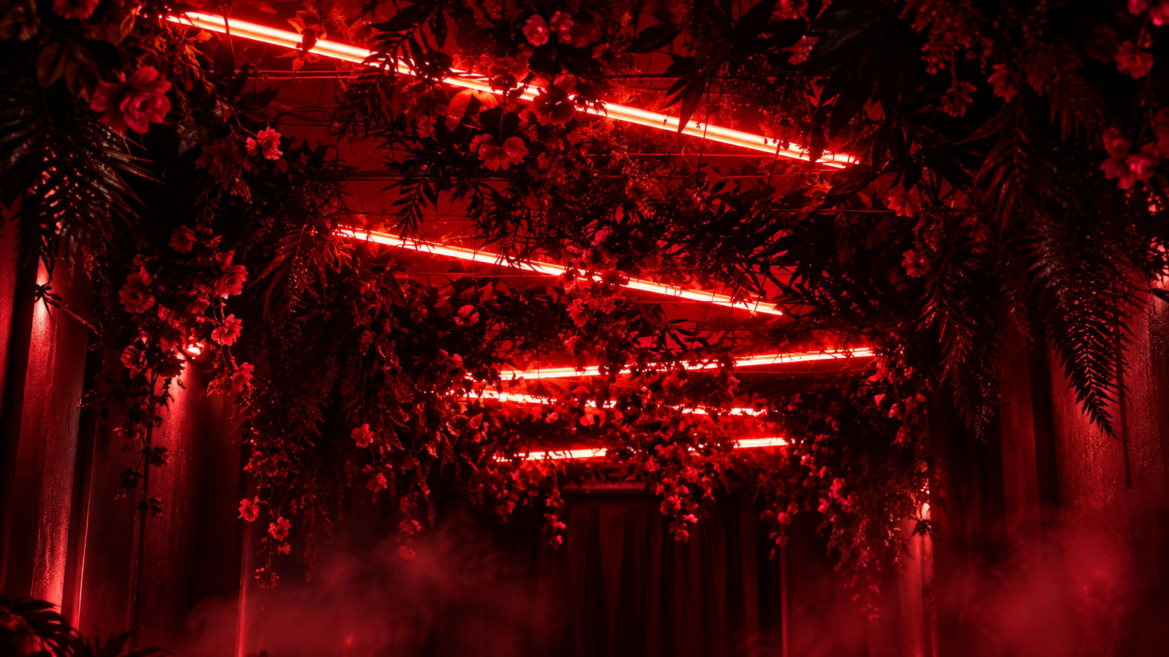 Hanging flowers under red neon tubes
